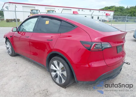 2023 Tesla Model Y Awd/Long Range Dual Motor All-Wheel Drive z USA, uszkodzony, nr VIN 7SAYGAEE6PF777290